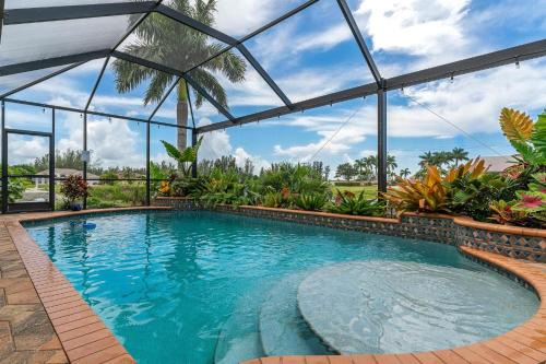 Burnt Store Casa | Gulf Access Sleeps 8 - Villa Tropicana - Roelens Vacations