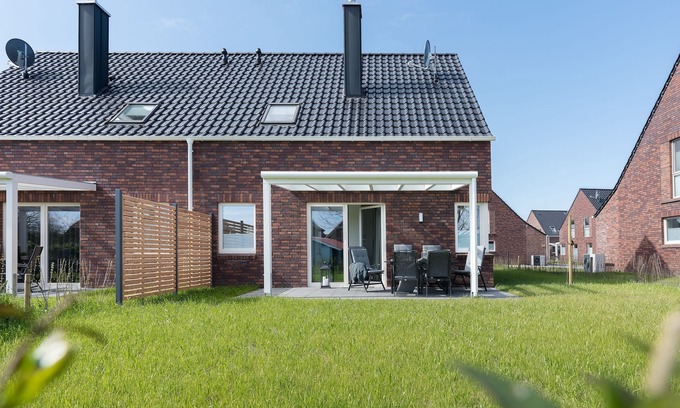 Butjadingen Casa | Haus Meerperle - Experience hygge. Sauna. Fireplace. Dogs welcome.