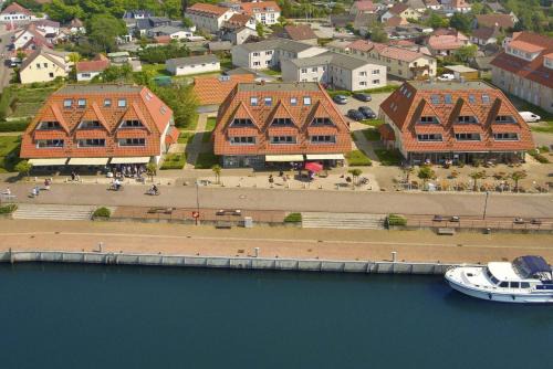 Wiek Apartamento | hafennahe Ferienwohnung mit Balkon und Meerblick - Hafenhäuser Wiek FeWo Wohnung 04