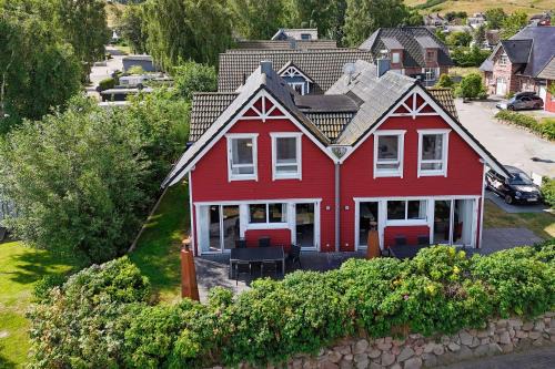 Monchgut-Granitz Casa | hafennahes Ferienhaus mit Terrasse und Meerblick - Ferienhaus TimpeTe Steuerbord