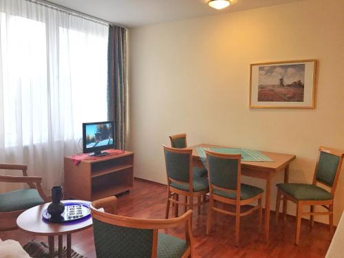 Wiek Apartamento | Hafenresidenz – Ferienwohnung 13 Dahlien