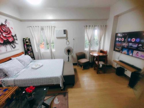 Trece Martires Apartamento | Happy Stays B - 300mbps - 65"TV Netflix, Disney - Washer