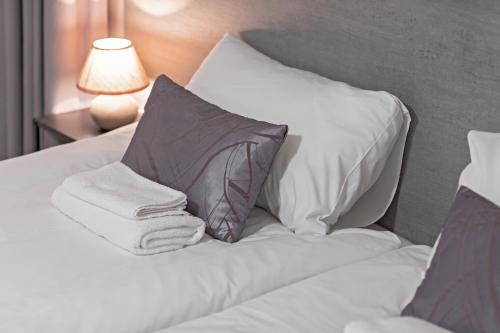 Kaunas Hostal | HappyInn Rooms