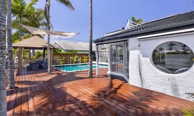 Runaway Bay Casa | Harborview Bliss: 4BR Coastal Retreat w/Pool