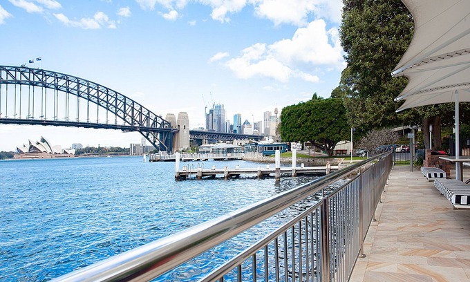 McMahons Point Apartamento | Acogedor apartamento junto al puerto con piscina con vistas al puente