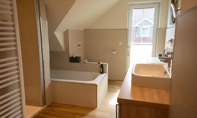 Wangerland Casa | Haus Friesenkuss mit Hund