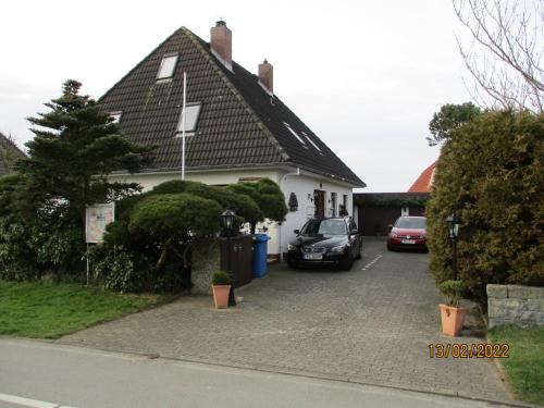 Stinteck Apartamento | Haus mit Lilie und Rose