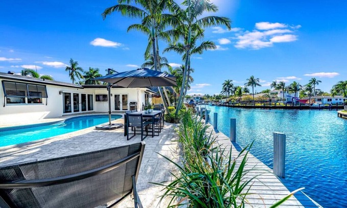 Garden Isles Casa | Heated Pool! WaterFront Home! 1 Mile To Beach!