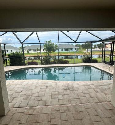 Pebble Beach Casa | Heated pool with canal views
