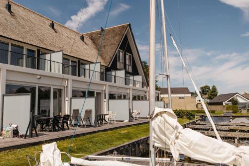 Heeg Complejo | Herenhuizen 6 of 8 persoons geschakeld - Boutique Parc Pharshoeke