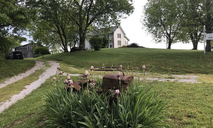 Carlisle Casa | Hilltop Farmhouse with sunrise sunset porch overlooking hills and holler