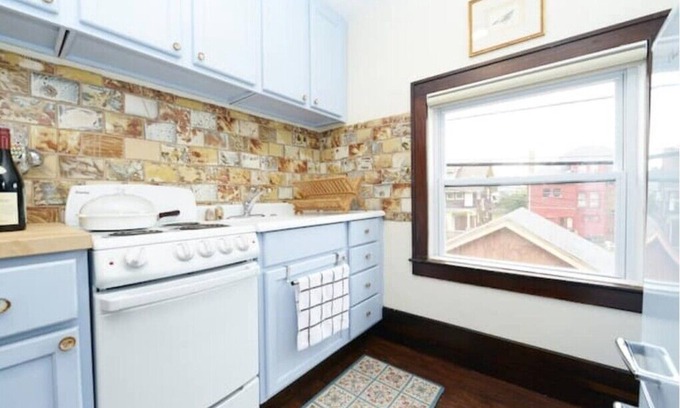 Highland Park Casa | Historic "Chauffeurs Quarters" Tiny House by Midtown, on Studebaker Estate
