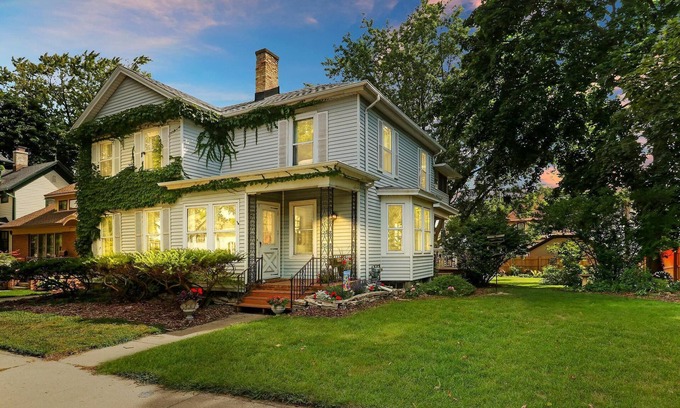 Racine Casa | Historic house on tree lined red brick street of historic homes.