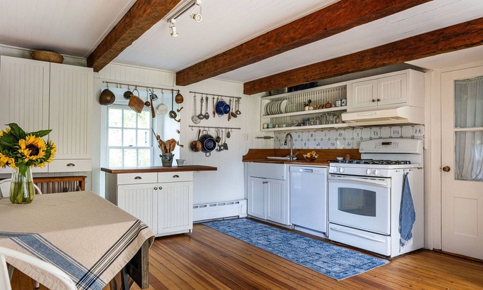 Accord Casa | Historic stone house & barn on 10 acres with patio, fireplace, & antique charm