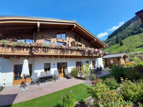 Rauris Apartamento | Hochalmbahnen Chalets Rauris 1-06 WE2 Maislaufeldweg 1g EG