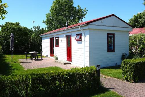 Drijber Chalet De Esquí | Hofgalow Chalet op camping "De Stal"