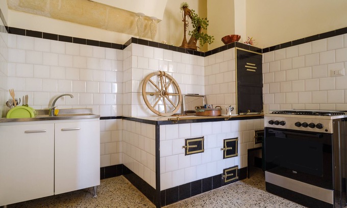 San Donato di Lecce Apartamento | Apartamento vacacional 1 - Palazzo Costantini con balcón, jardín compartido y Wi-Fi