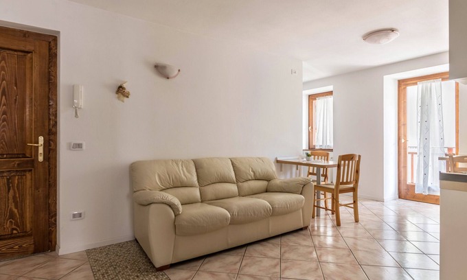 Baselga di Pine Apartamento | Apartamento vacacional 'Appartamento Lucia' con balcón privado y Wi-Fi