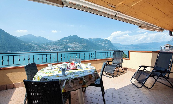 Sensole Apartamento | Apartamento vacacional "Bella Isola" con vistas al lago, terraza privada y Wi-Fi