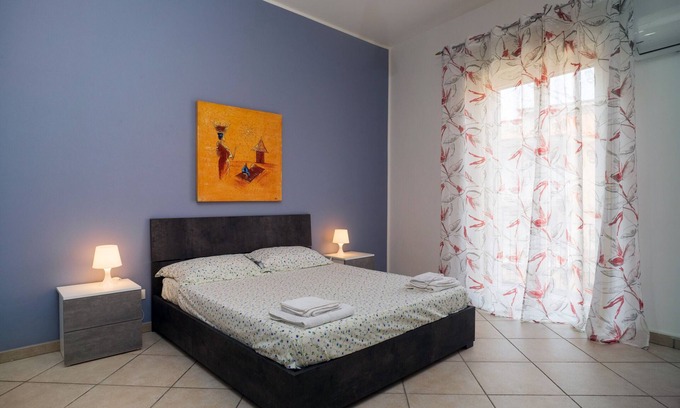 Monte Po-Nesima-San Leone-Rapisardi Apartamento | Apartamento vacacional "Casa Cairoli" con balcón y aire acondicionado