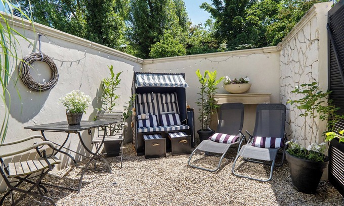 Neuenkirchen Apartamento | Apartamento 'Gästewohnung Am See - Maisonette' con terraza privada, jardín privado y Wi-Fi