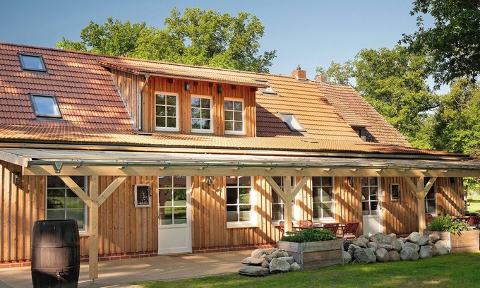Strohen Apartamento | Apartamento vacacional "Eichengeflüster Waldhütte" con gran terraza cubierta en Ströhen