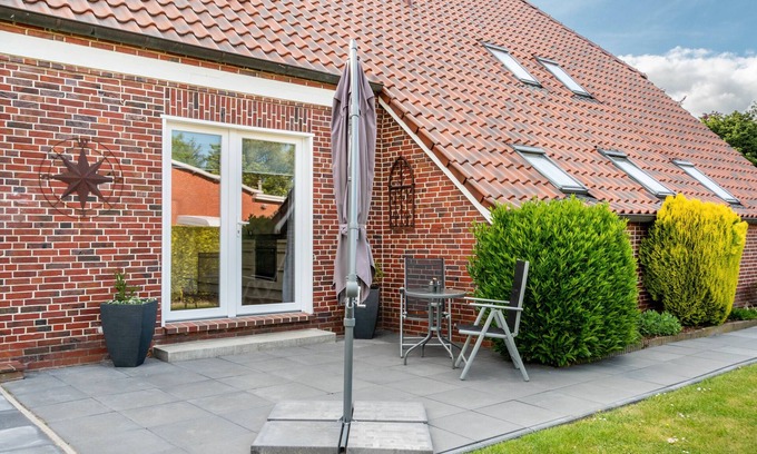Emden Apartamento | Apartamento vacacional 'Ferienhaus Behrends' con terraza privada y Wi-Fi