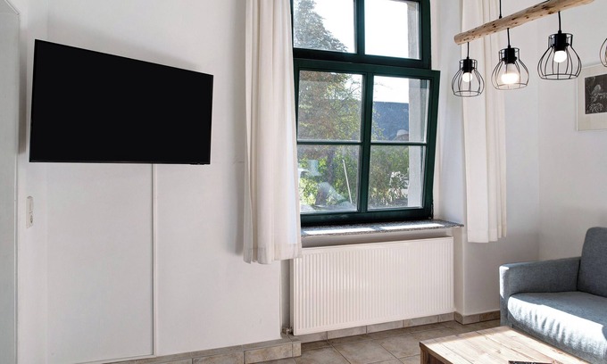 Muritz Apartamento | Apartamento vacacional 'FeWo E1' con jardín comunitario y wifi