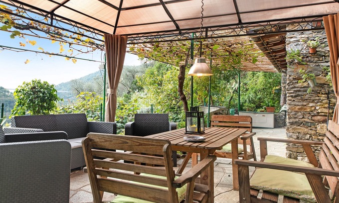 Avegno Apartamento | Apartamento vacacional "Le Cicale a Due Passi dal Mare" con jardín compartido