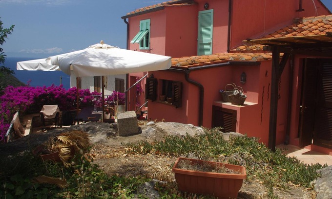 Patresi Apartamento | Apartamento vacacional 'Rosa dei Venti' con vistas al mar y terraza privada