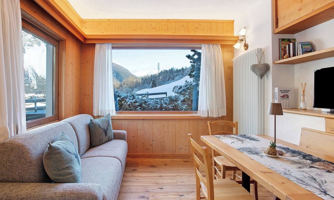 Valdidentro Apartamento | Apartamento vacacional "Tra-Monti E Mare" con vistas a la montaña, terraza privada y sauna