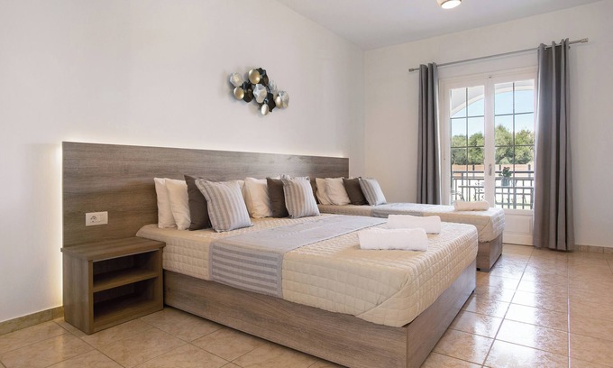 Alykes Apartamento | Apartamento vacacional "Tropical Studio 3" con jardín compartido, aire acondicionado y Wi-Fi