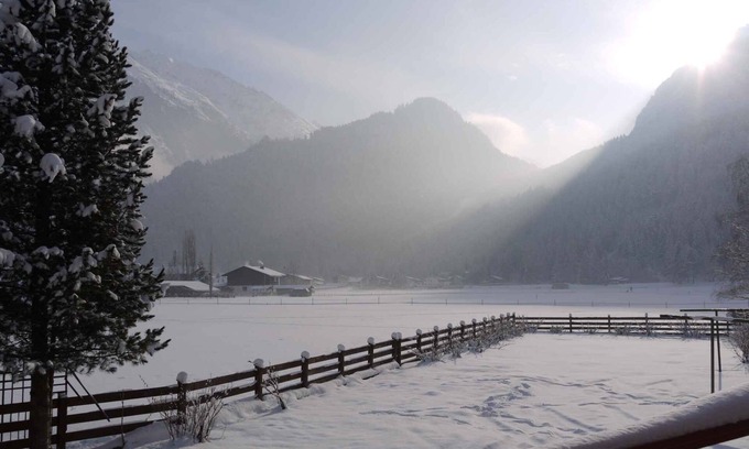 Huben Apartamento | Apartamento vacacional sala de Tirol, con estufa de azulejos y lavavajillas