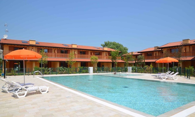 Lignano Pineta Apartamento | Apartamento vacacional con jardín privado