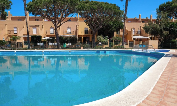 Poblado Sancti Petri Casa | Casa de vacaciones "Marisa" con piscina, jardín, terraza, balcón y Wi-Fi