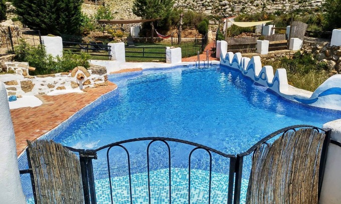 La Torre d'En Besora Casa | Casa de vacaciones 'Moli Colomer' con vistas a la montaña, piscina compartida y terraza privada