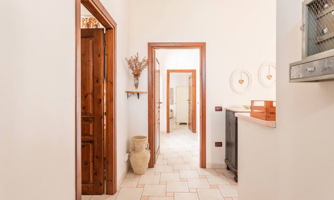 Scano di Montiferro Casa | Casa de vacaciones 'La Casa Rosa Di Rita E Franco' con balcón y Wi-Fi