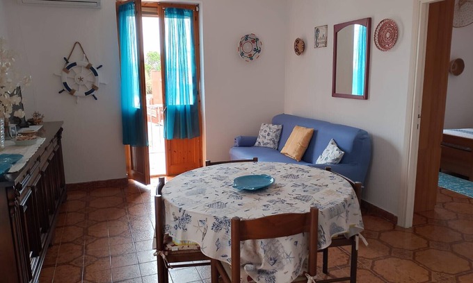 Lu Bagnu Casa | Holiday Home 'Al Mare' with Private Garden, Balcony and Air Conditioning
