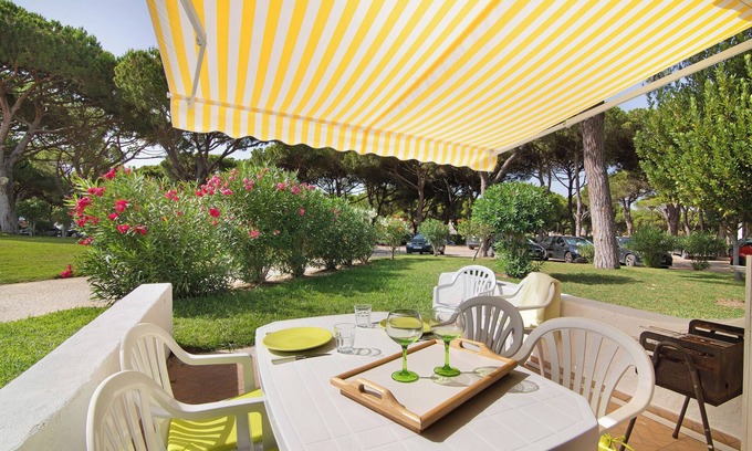 Aldeia das Acoteias Casa | Casa de vacaciones 'Aldeia Das Açoteias' con terraza privada, jardín compartido y aire acondicionado