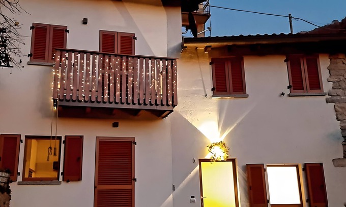 Erve Casa | Casa de vacaciones 'Casa Il Butto' con vistas a la montaña, jardín compartido y balcón