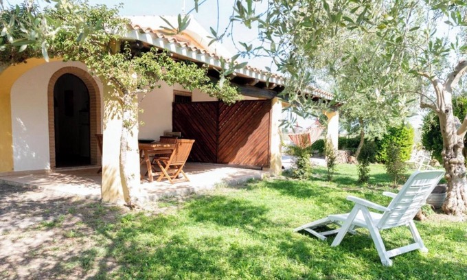 Orosei Casa | Casa de vacaciones 'Casa Su Barone' con terraza privada, jardín privado y aire acondicionado.