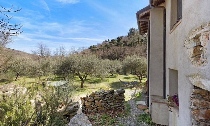 Rialto Casa | Casa de vacaciones 'Del Fiume' con vistas a la montaña y jardín privado