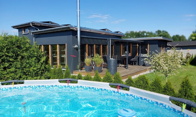 Oberhavel Casa | Casa de vacaciones 'Happy-Nest' con piscina compartida, Wi-Fi y aire acondicionado