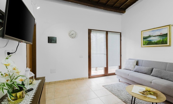 Palmas Arborea Casa | Casa de vacaciones 'Apartamento Il Corbezzolo' con terraza compartida, Wi-Fi y aire acondicionado
