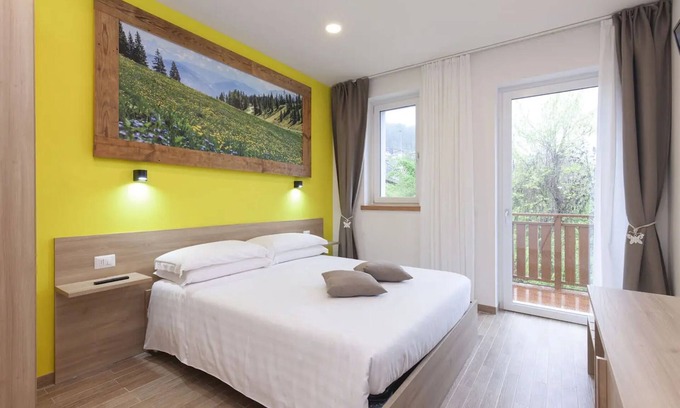 Domegge di Cadore Casa | Casa de vacaciones 'Alle Arce' con vistas al lago, Wi-Fi y aire acondicionado