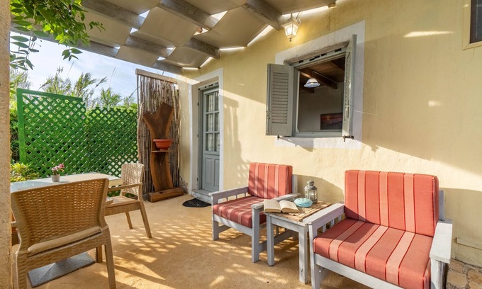Ag. Georgios Casa | Casa de vacaciones 'Myrto' con vistas al mar, terraza privada y aire acondicionado