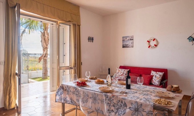 La Strea Casa | Casa de vacaciones 'Villetta Privata Hoana Sul Mare' con vistas al mar, jardín y aire acondicionado