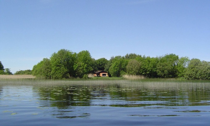 Woodford Casa | Romántica casa de vacaciones con barco entre el lago y pantano