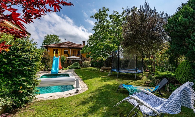 San Juan de Parres Casa | Casa de vacaciones con vistas a la montaña, piscina climatizada y jardín infantil