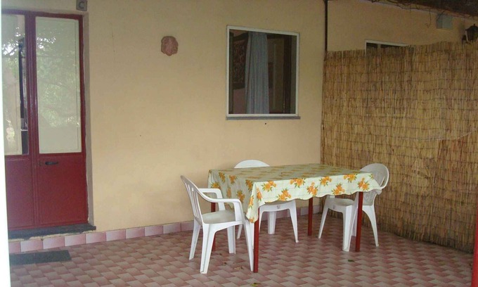 Sant'Anna Casa | Casa vacacional Con terraza rodeada de un limonero.